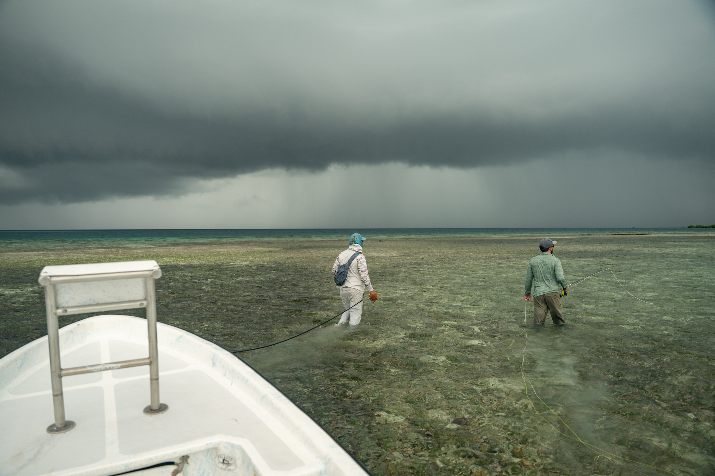 storm clouds in belize ocean waters